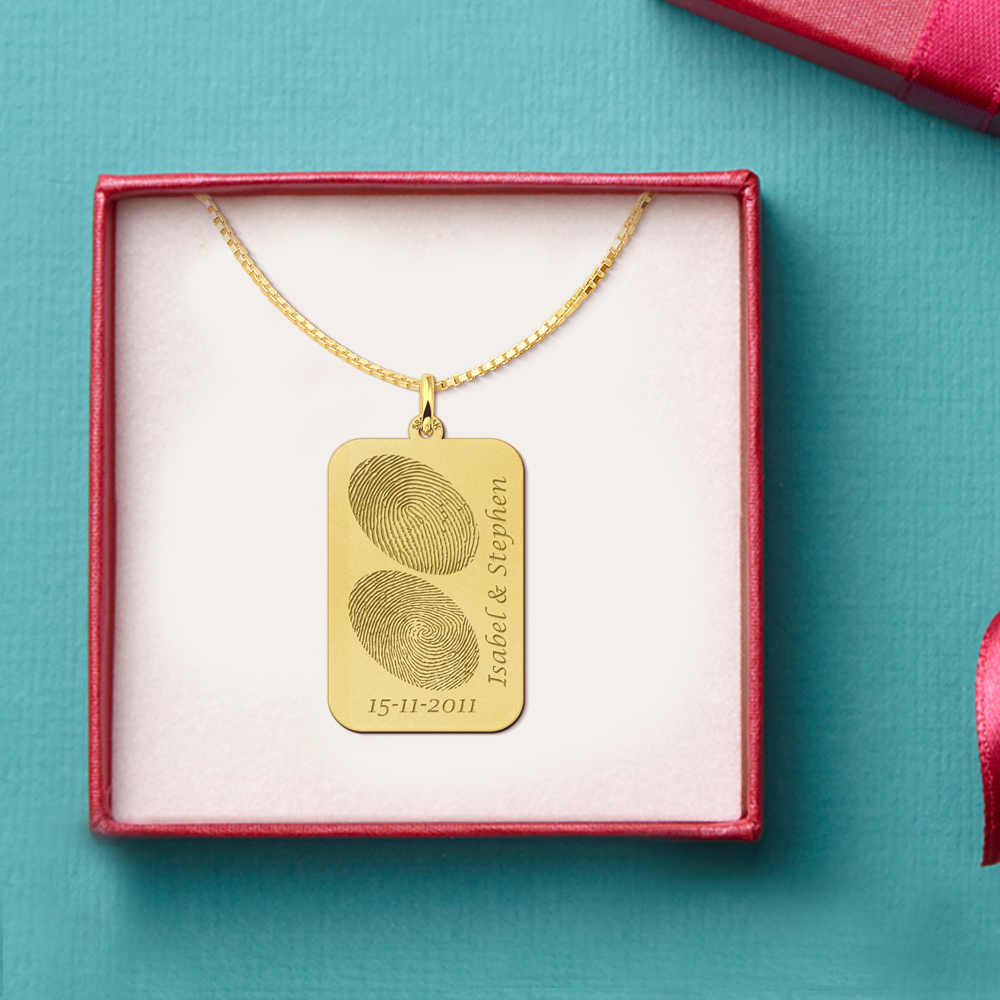 Goldener Dogtag mit zwei Fingerprints